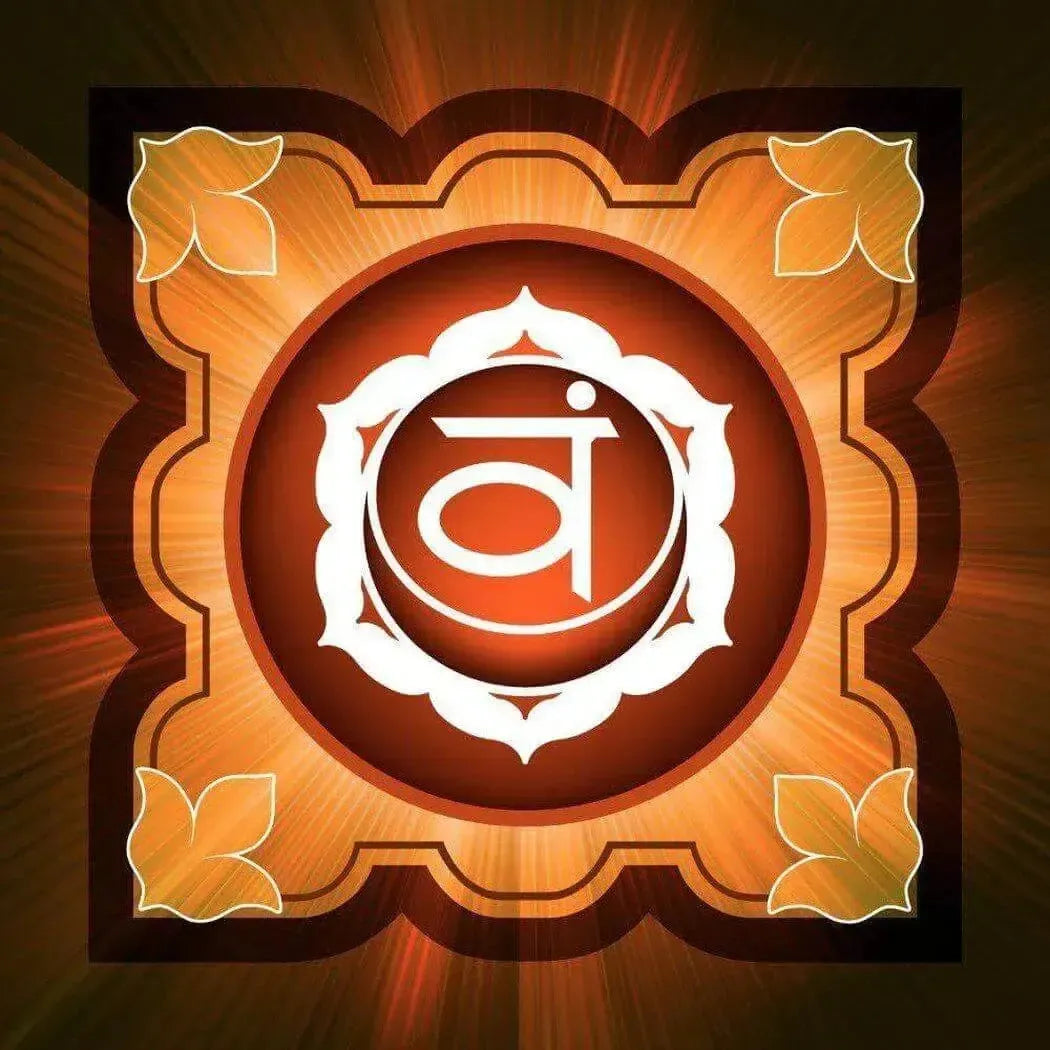 Golden-orange chakra symbol with white lotus and Sanskrit ā in Kismet Fragrance Blend