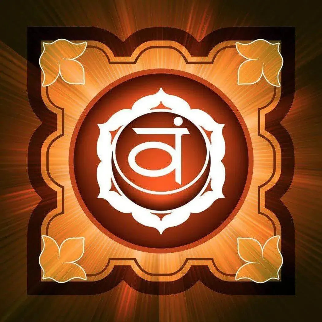 Golden-orange chakra symbol with white lotus and Sanskrit ā in Kismet Fragrance Blend