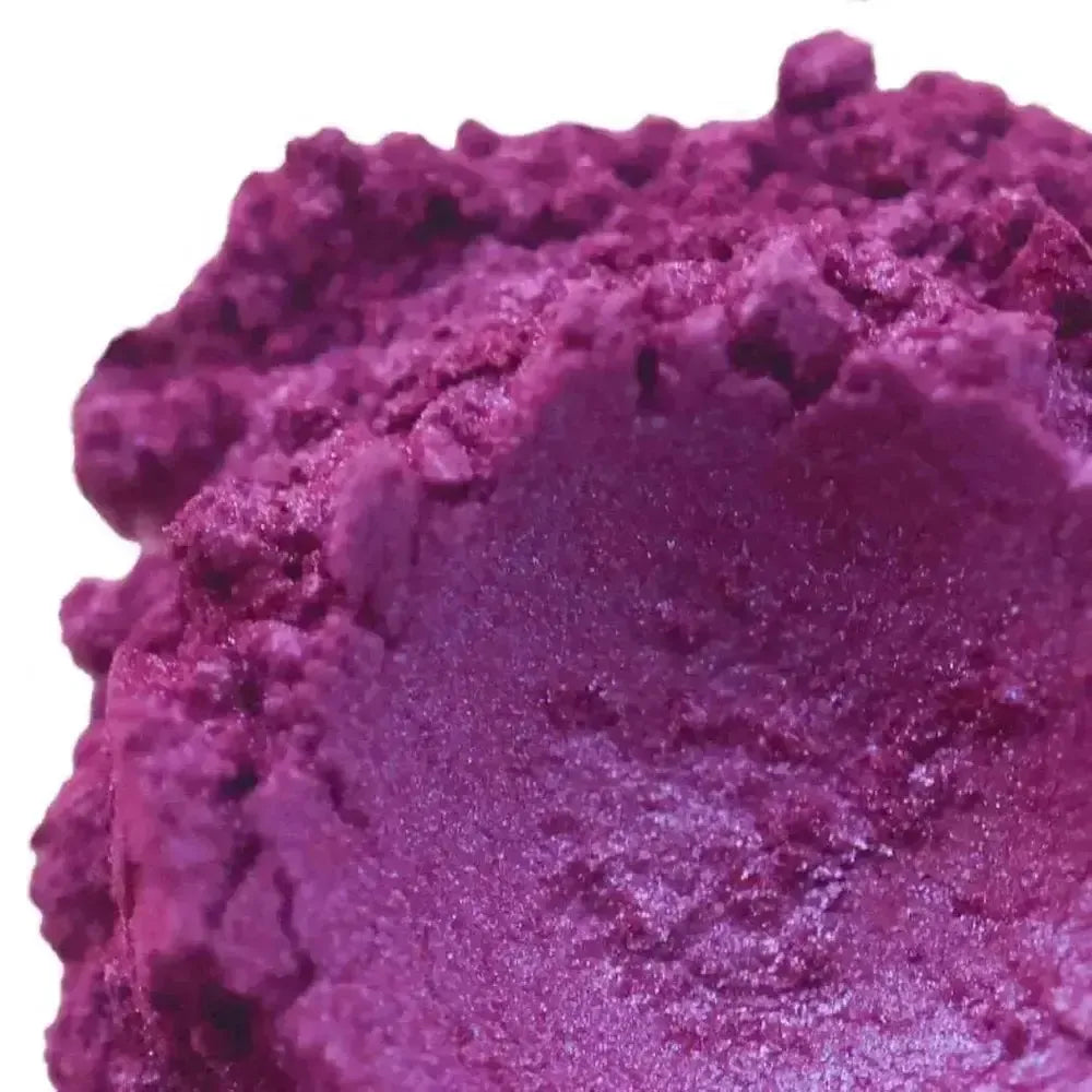 Close-up of vibrant Cabaret Pink/Purple Mica powder, perfect for creating dazzling soaps and bath bombs.