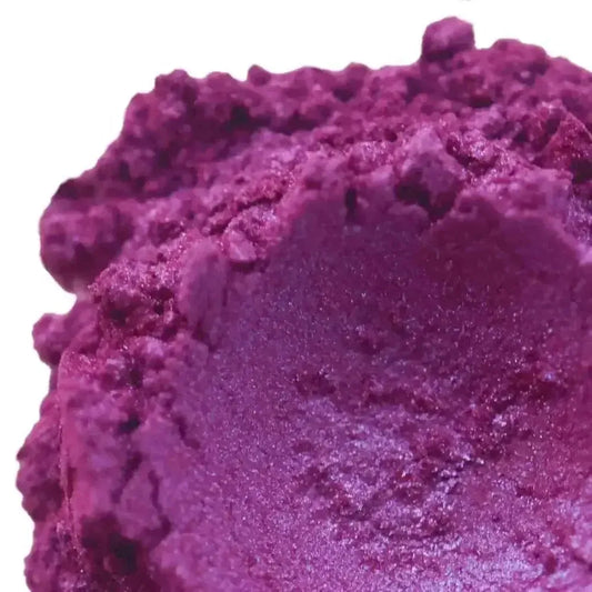 Close-up of vibrant Cabaret Pink/Purple Mica powder, perfect for creating dazzling soaps and bath bombs.