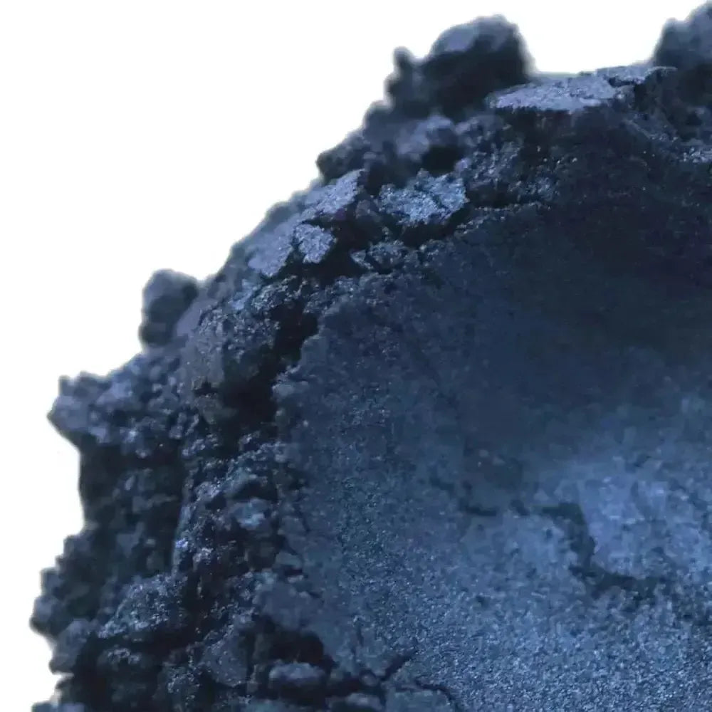 Close-up of Dark Navy Blue Mica powder showcasing a rich, deep blue with black undertones, perfect for creative projects.