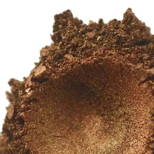 Close-up of Lustrous Brown Mica pigment, showcasing its radiant dual-toned brown and gold shimmer.