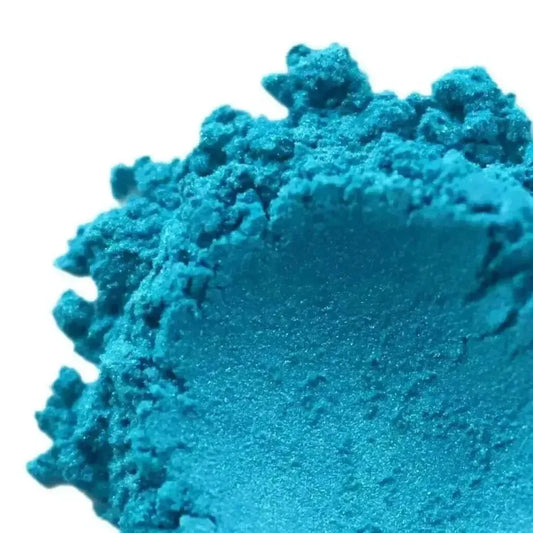Vibrant teal-turquoise pigment of Siren's Song Mica, perfect for enhancing creative projects.