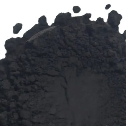 Finely powdered Black Iron Oxide pigment for bold cosmetic creations, showcasing a deep black hue.