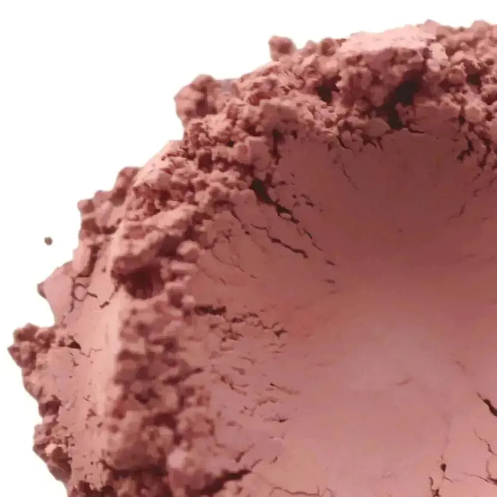 Rose Kaolin Natural Clay: mound of dusty rose powder with matte finish