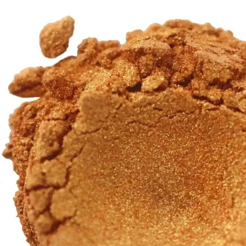 Maya Gold Mica: shimmering golden-orange glittery pressed powder