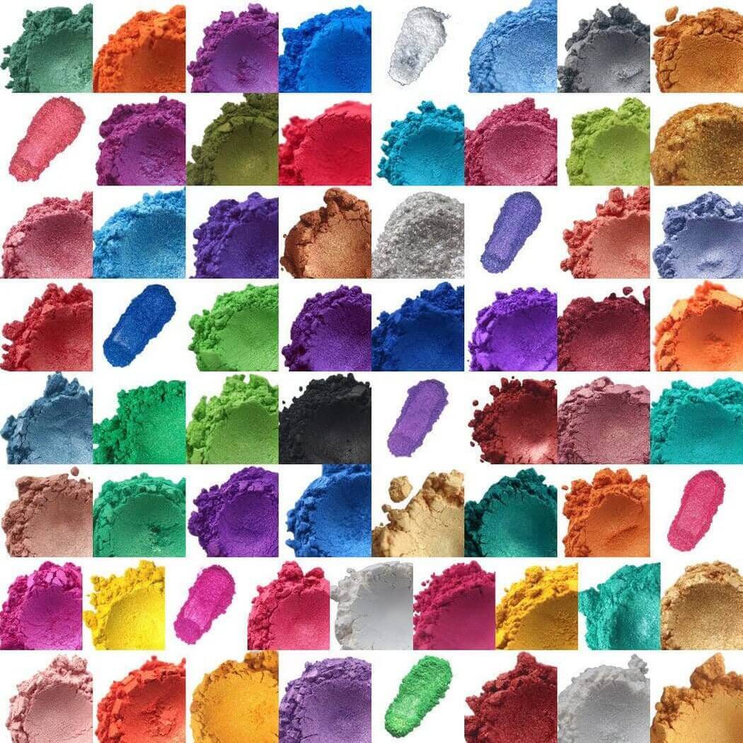 Colorful Nurture Handmade pigments in various shades, displayed in small piles and swatches, ideal for creative and DIY projects.