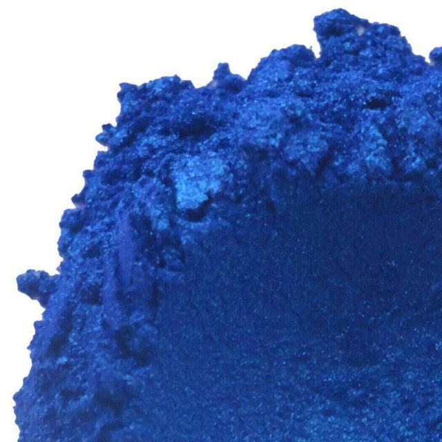 Close-up of vibrant blue pigment powder, perfect for Nurture Handmade crafts and projects.