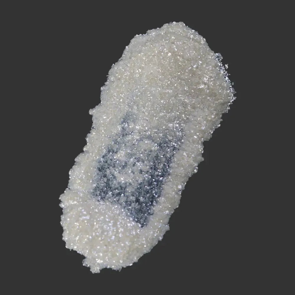 Mystic Gold White Mica Glitter specimen with rough white glitter and blue center