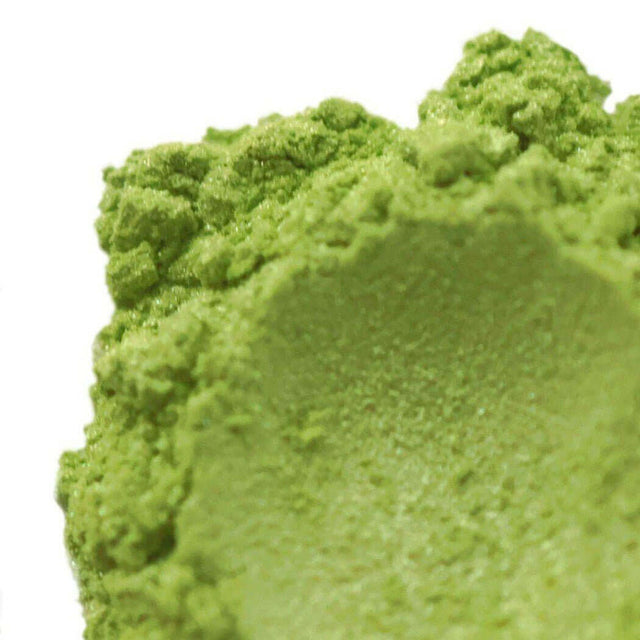 Close-up of green matcha powder texture. Nurture handmade matcha for organic and wholesome tea experience.