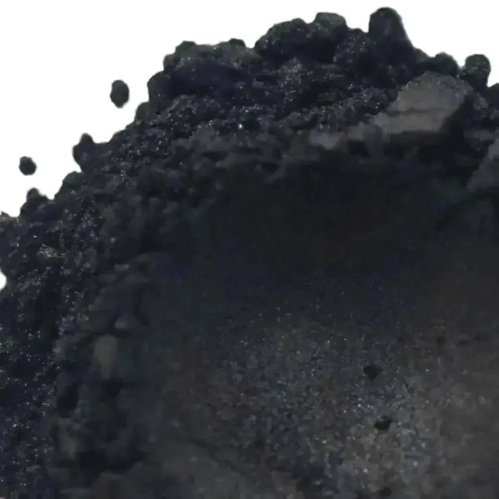 Nocturnal Black Mica: coarse dark gray to black granular pile with rough texture