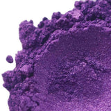 Close-up of vibrant purple pigment powder, used for handmade crafts by Nurture Handmade