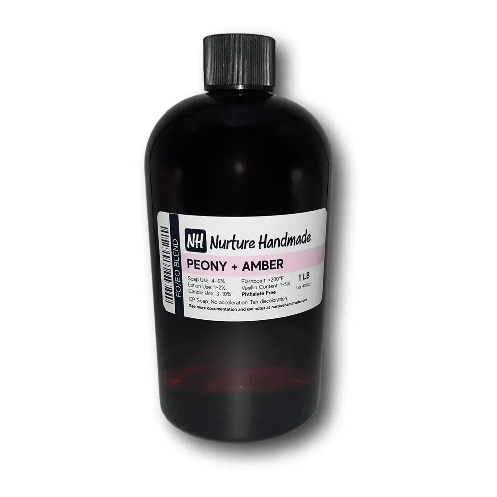 Peony + amber fragrance oil in dark amber glass bottle with nurture handmade branding