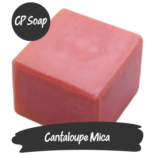 Cantaloupe Pink Mica cube soap showcasing a unique coral hue blending orange and pink for creative projects.
