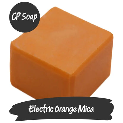 Bright Electric Orange Mica powder block for crafting, perfect for adding vibrant color to CP soap projects.