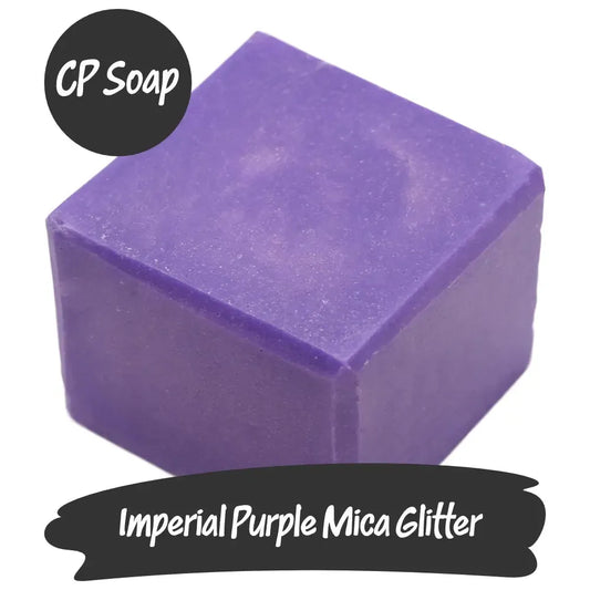Imperial Purple Mica Glitter showcasing a vibrant purple soap cube for luxurious DIY creations.