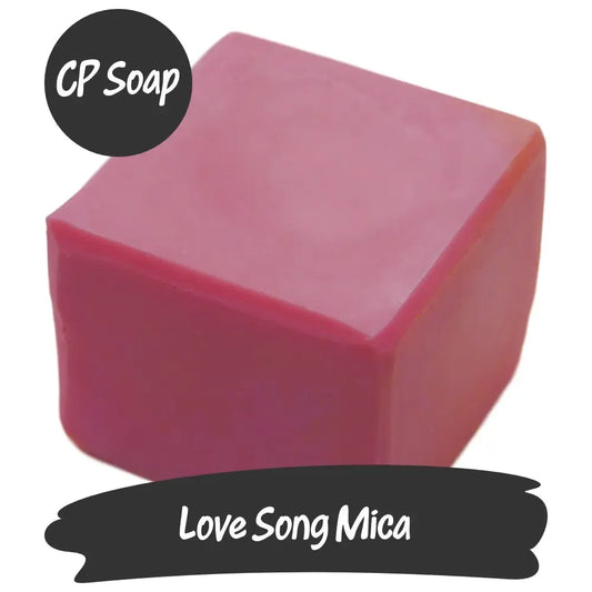 Warm pink Love Song Mica CP soap cube with a shimmering silvery sheen, perfect for enchanting crafts.