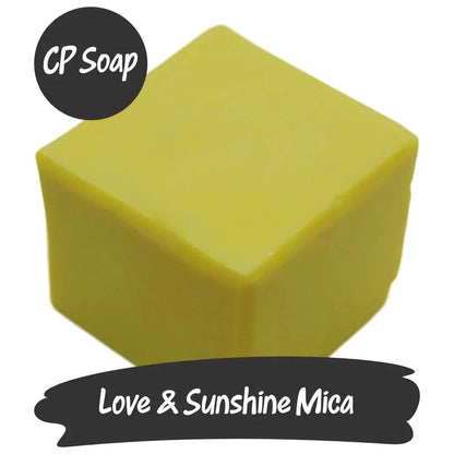 Vibrant yellow CP soap showcasing Love & Sunshine Mica for creative projects with a warm glow.