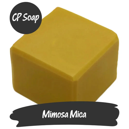 Mimosa Mica CP soap block, showcasing a vibrant golden yellow hue, perfect for DIY crafting and adding sparkle.