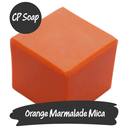 Vibrant block of Orange Marmalade Mica CP Soap, showcasing rich red-orange hues for creative projects.