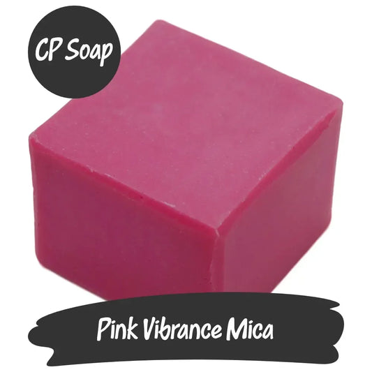 Vibrant pink mica cube for crafting, ideal for adding bold hues to CP soap and other DIY projects.