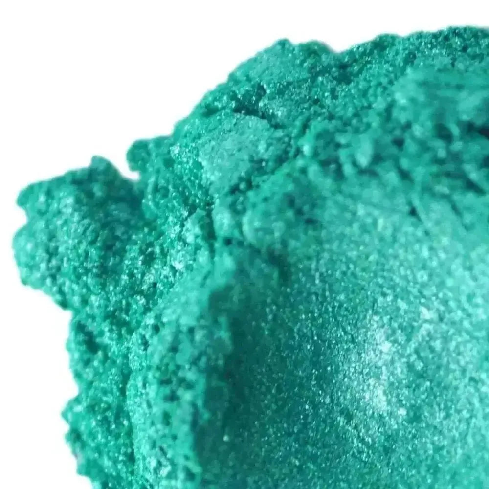 Vibrant teal Rainforest Blue Green Mica powder with fine textured surface