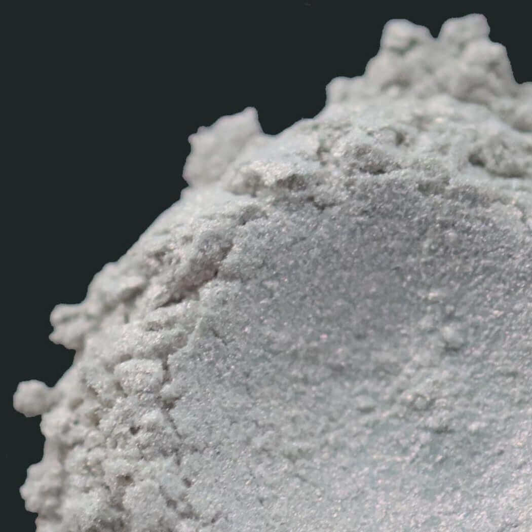 Close-up of finely ground white powder used in handmade products by Nurture Handmade.