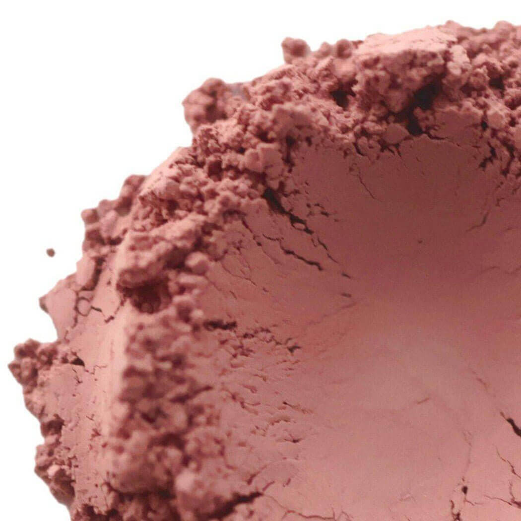 Close-up of pink powder texture, Nurture Handmade beauty product.