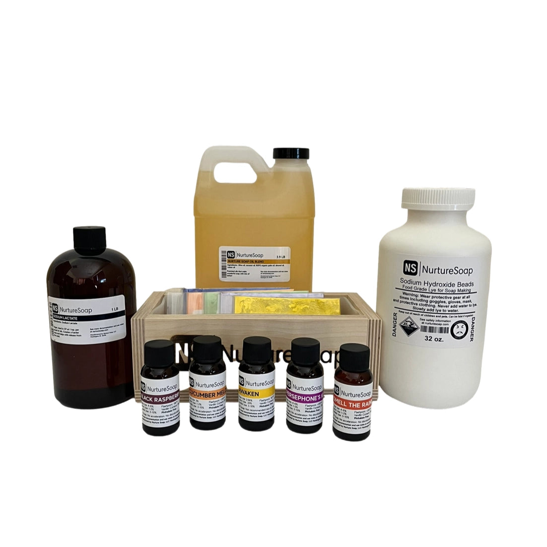 Cold Process Soap Making Kit with oils, lye, fragrance sample bottles, and soap mold