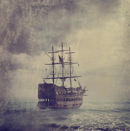 A vintage ship sailing through misty waters, evoking a sense of adventure and exploration.