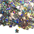 Iridescent black Supernatural Biodegradable Glitter pile with penguin charm