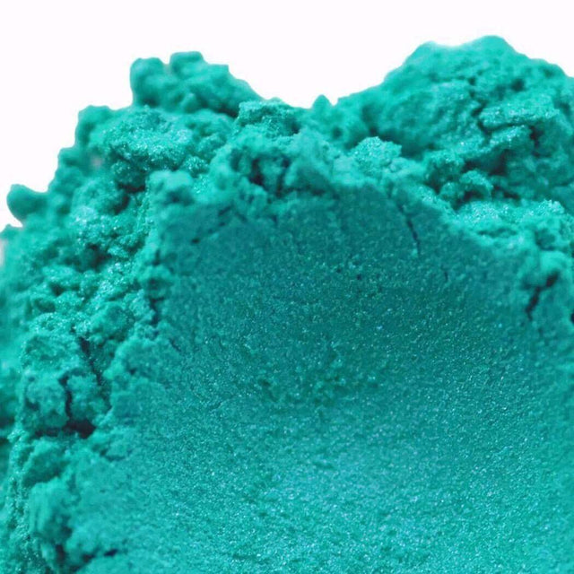 Close-up of vibrant teal handmade clay texture from Nurture Handmade