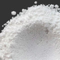 Fine white crystalline titanium dioxide powder mound
