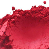 Vibrant red powder for crafting and handmade products labeled "Nurture Handmade".