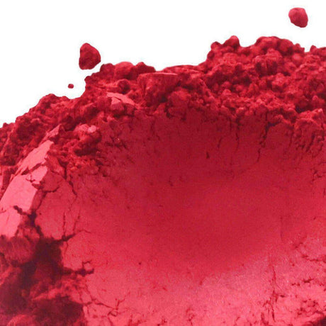 Vibrant red powder for crafting and handmade products labeled "Nurture Handmade".