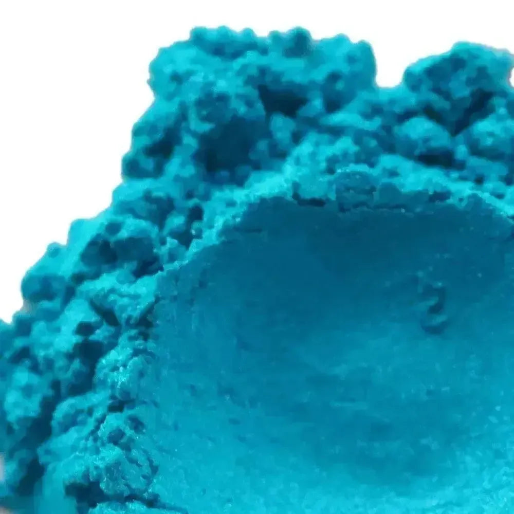 Vibrant turquoise Tropical Teal Mica powder with crumbly texture