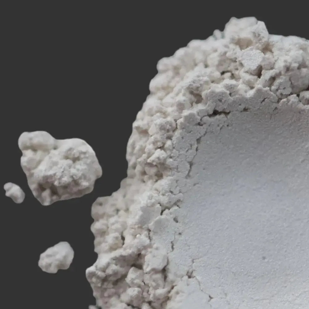 Velvet Pearl White Mica: fine white powder mound with small clumps