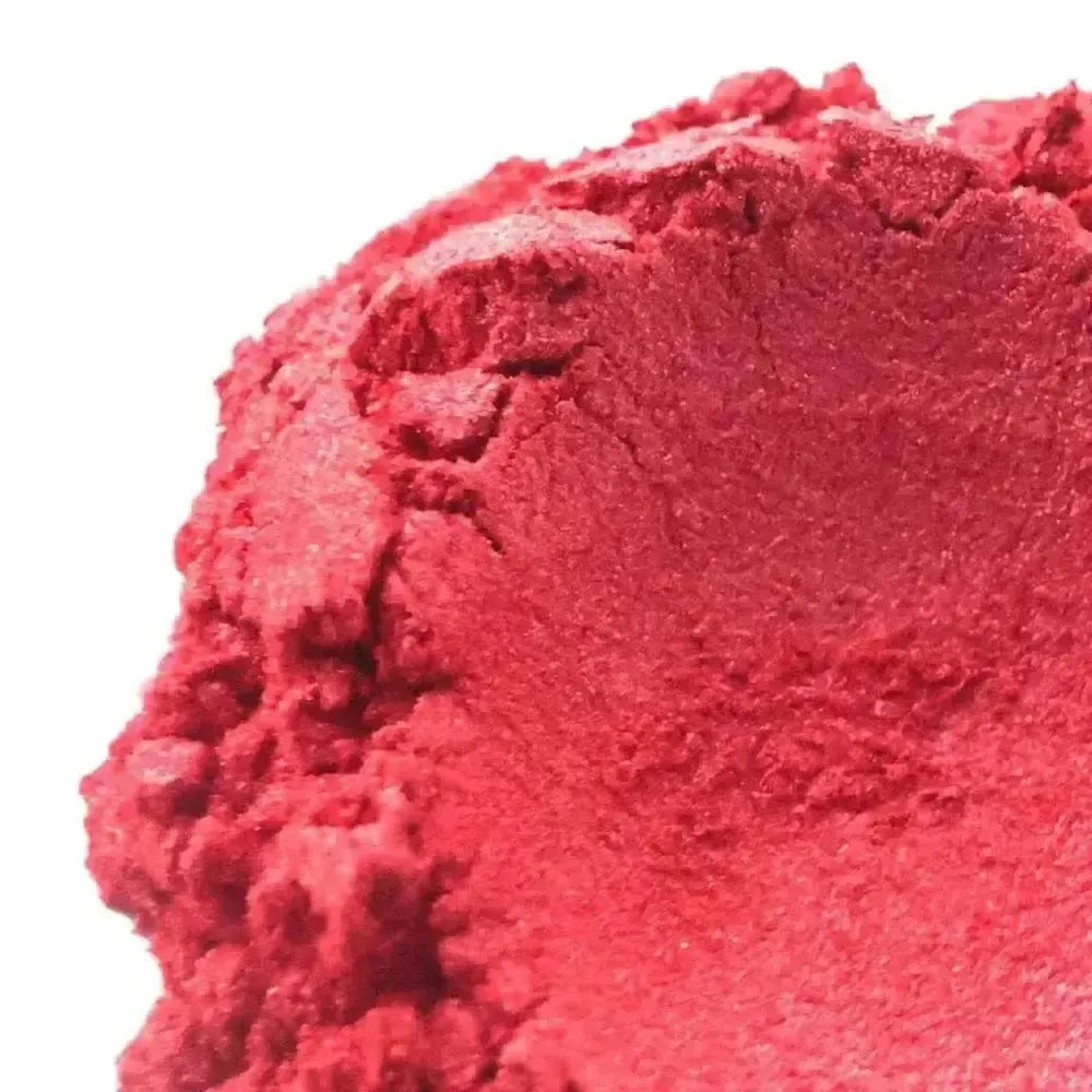 Vibrant finely textured pile of bright red Wanderlust Pink Mica powder