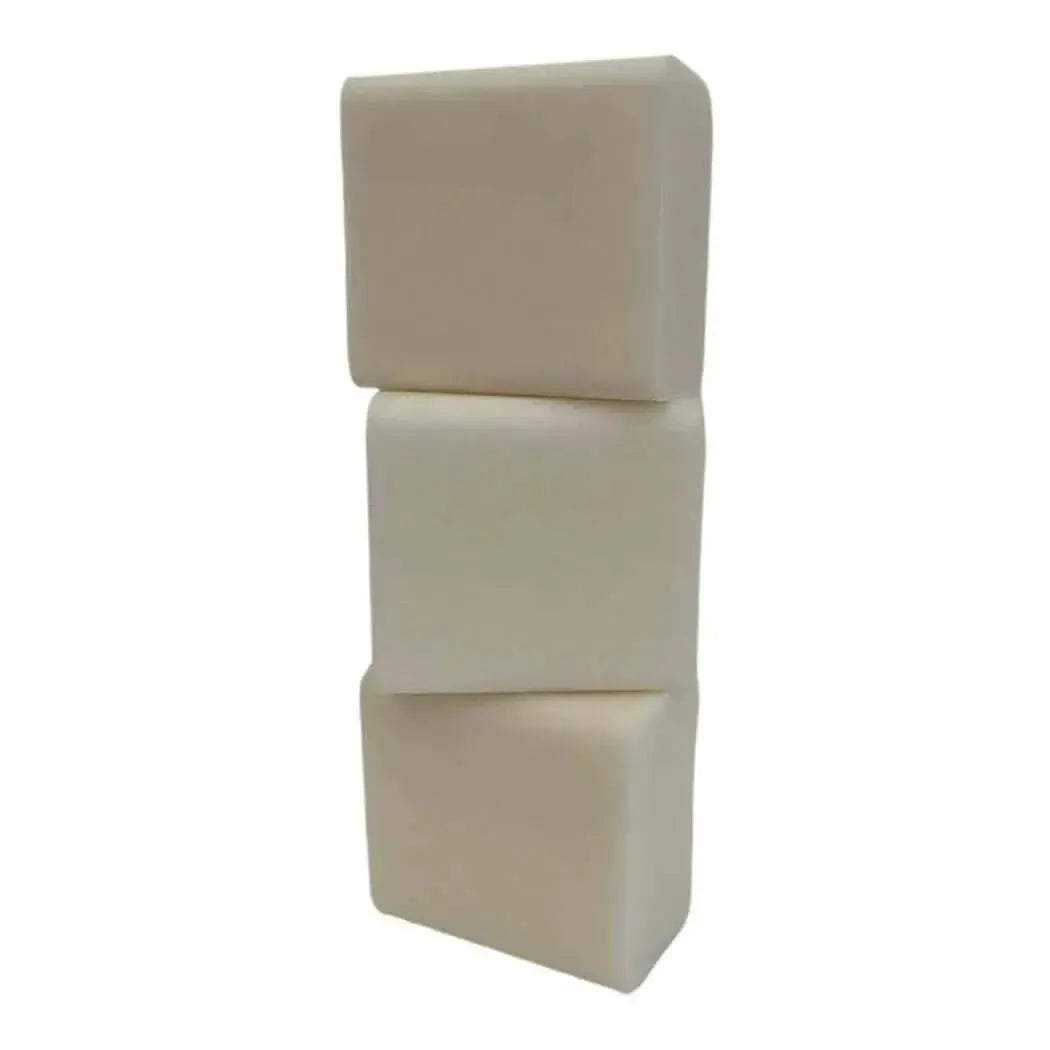 Three stacked off-white rectangular Low Sweat White Soap Base bars